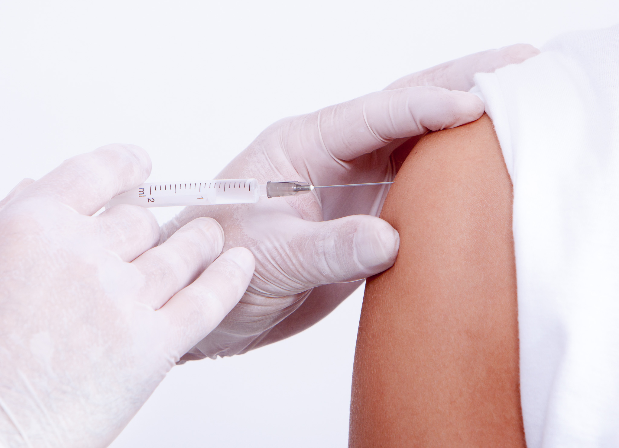 Nurse giving a vaccine for a patient
